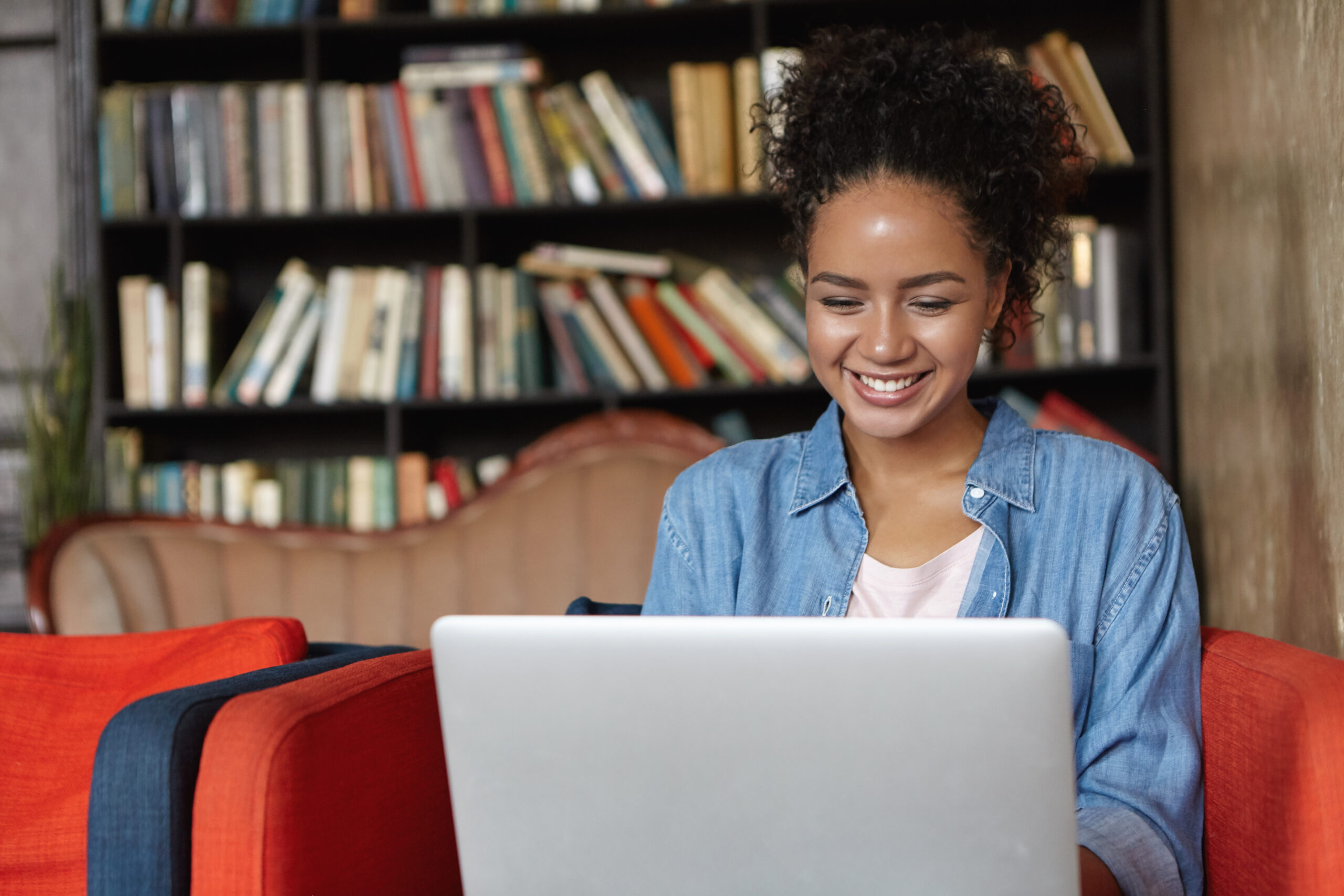 female sitting in front of a computer